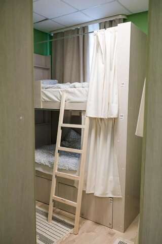 Хостел Брусника Петрозаводск Кровать в общем 6-местном номере для мужчин и женщин-2